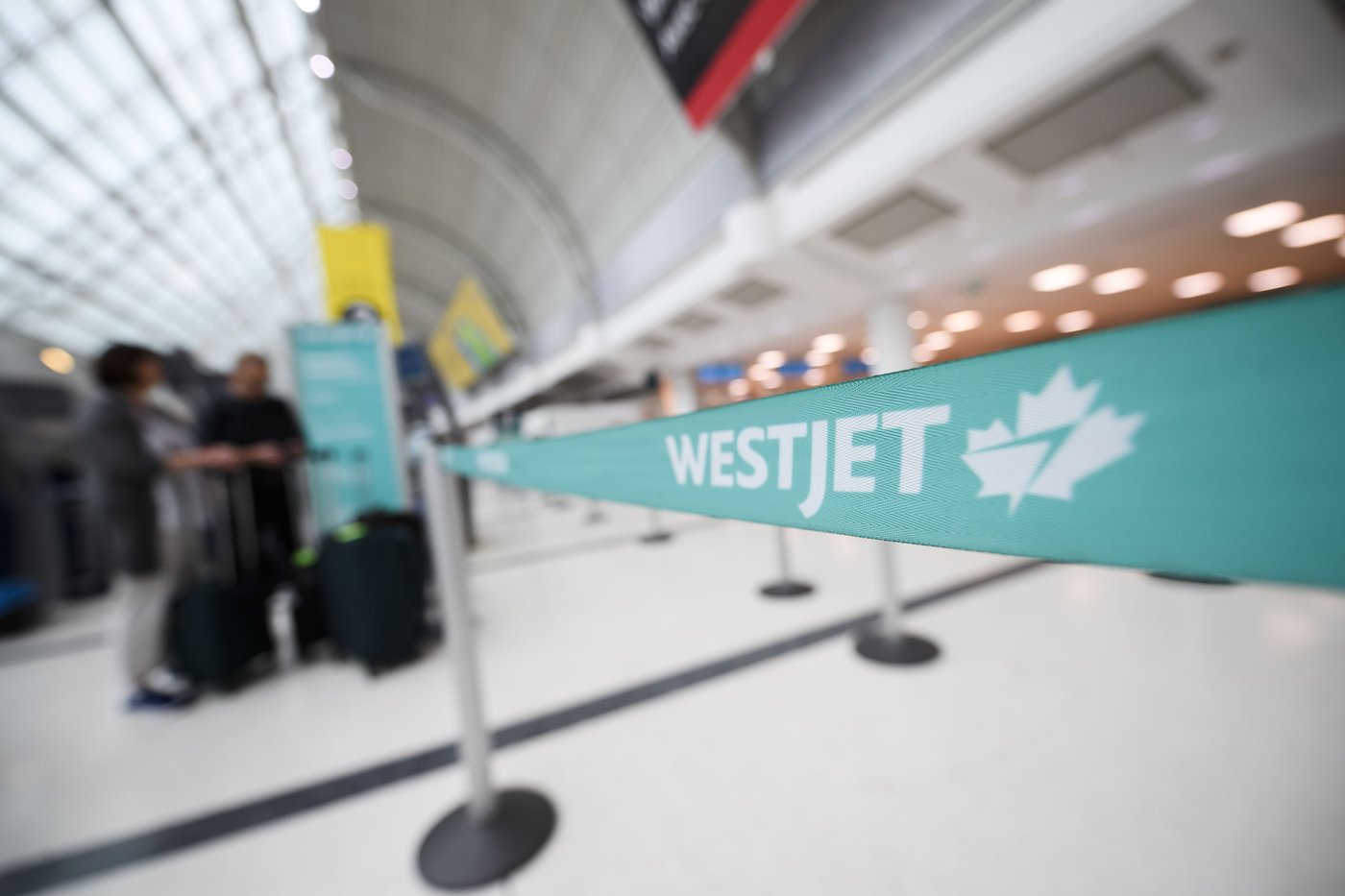 Travellers stuck in Calgary, others trying to return as WestJet flight attendants' strike ends