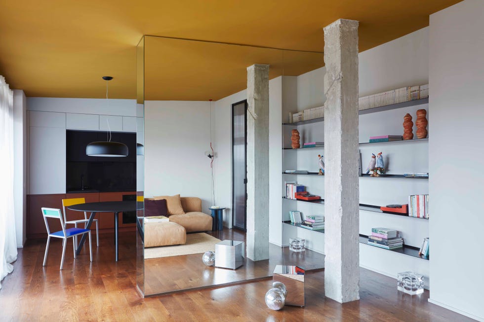 modern living space with segmented areas and distinctive decor