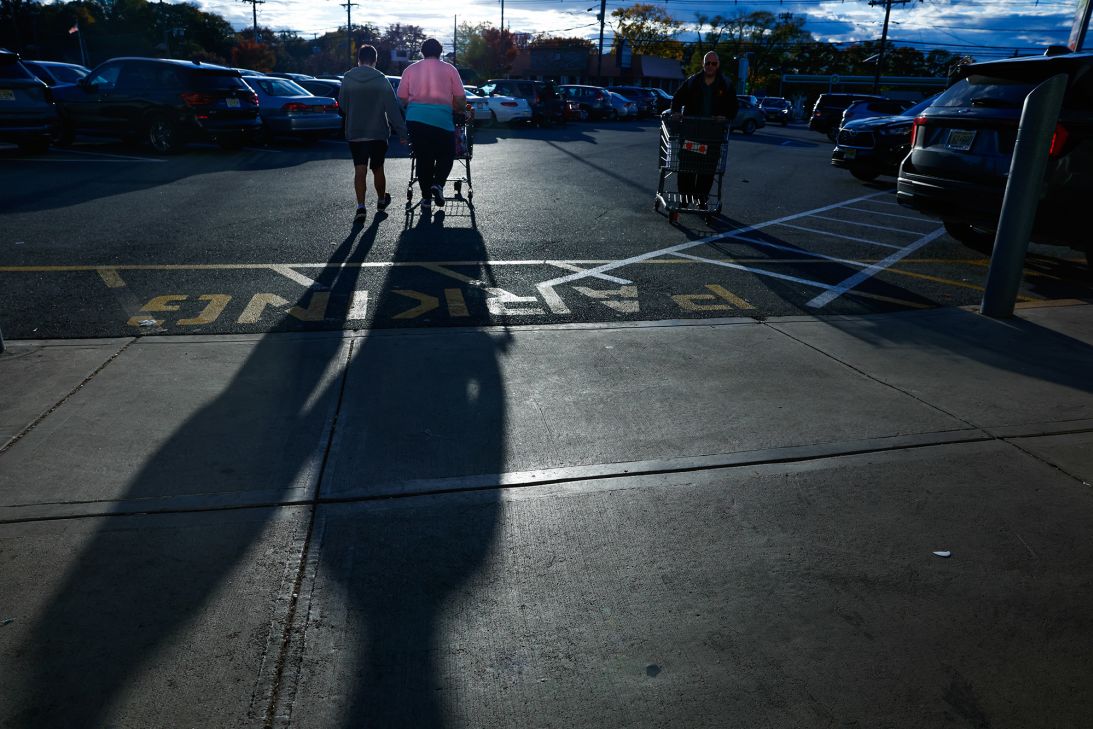 Shoppers outside a grocery store in Bergenfield, New Jersey, on October 24, 2025.