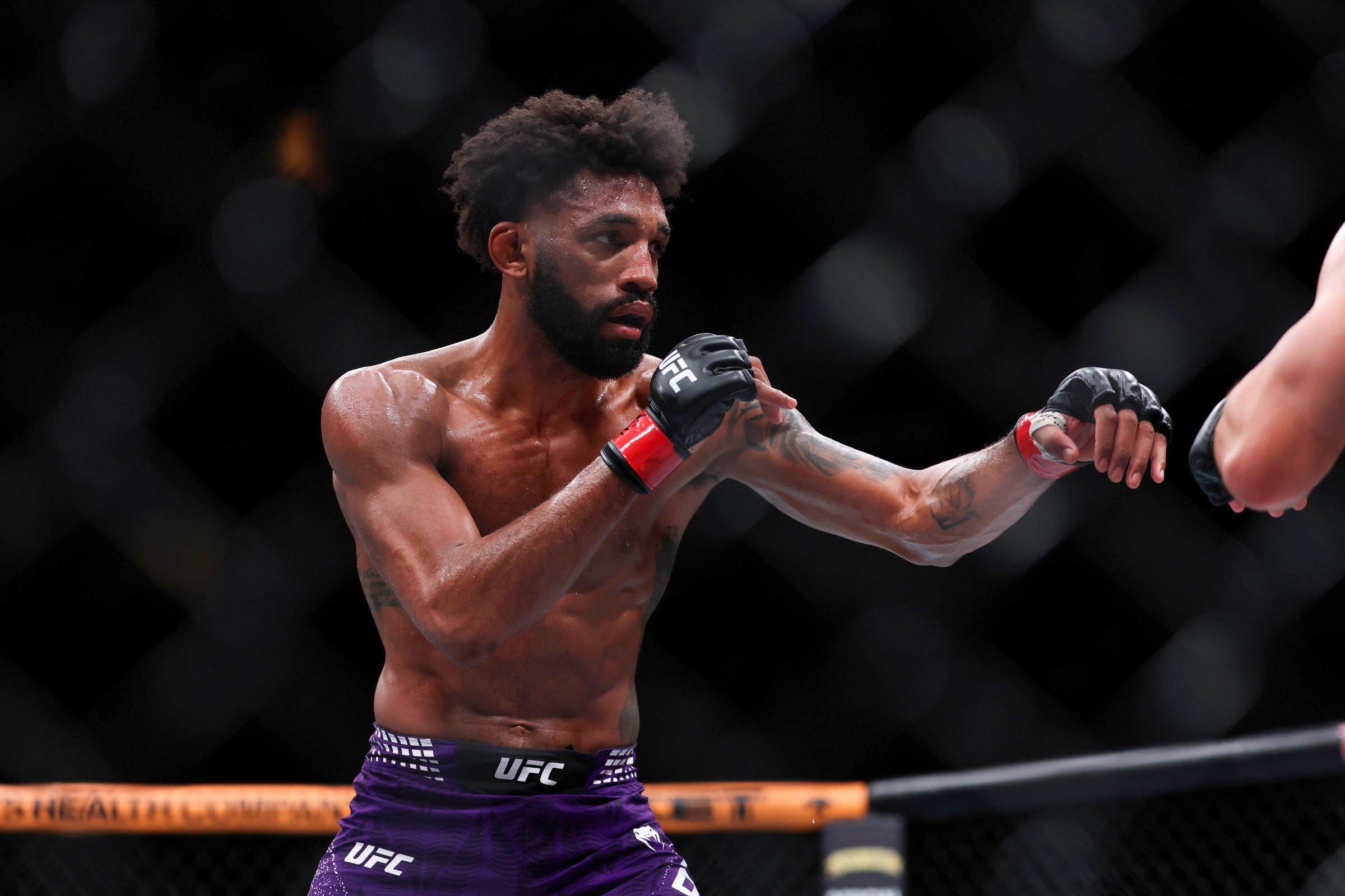 HOUSTON, TEXAS - FEBRUARY 21: Phil Rowe looks to exchange in a welterweight bout against Jean-Paul Lebosnoyani during UFC Fight Night at Toyota Center on February 21, 2026 in Houston, Texas. (Photo by Jack Gorman/Getty Images)