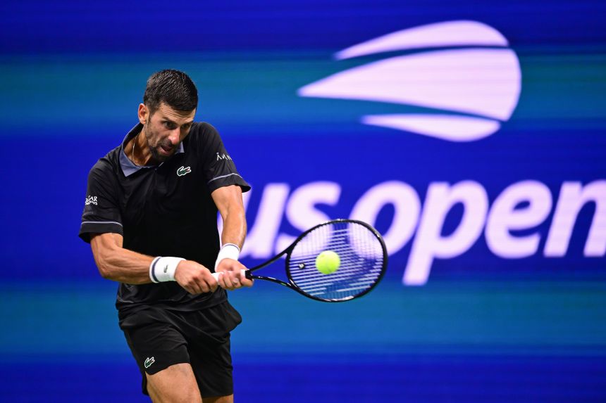 Djokovic in action against Navone on Sunday night at Arthur Ashe Stadium.