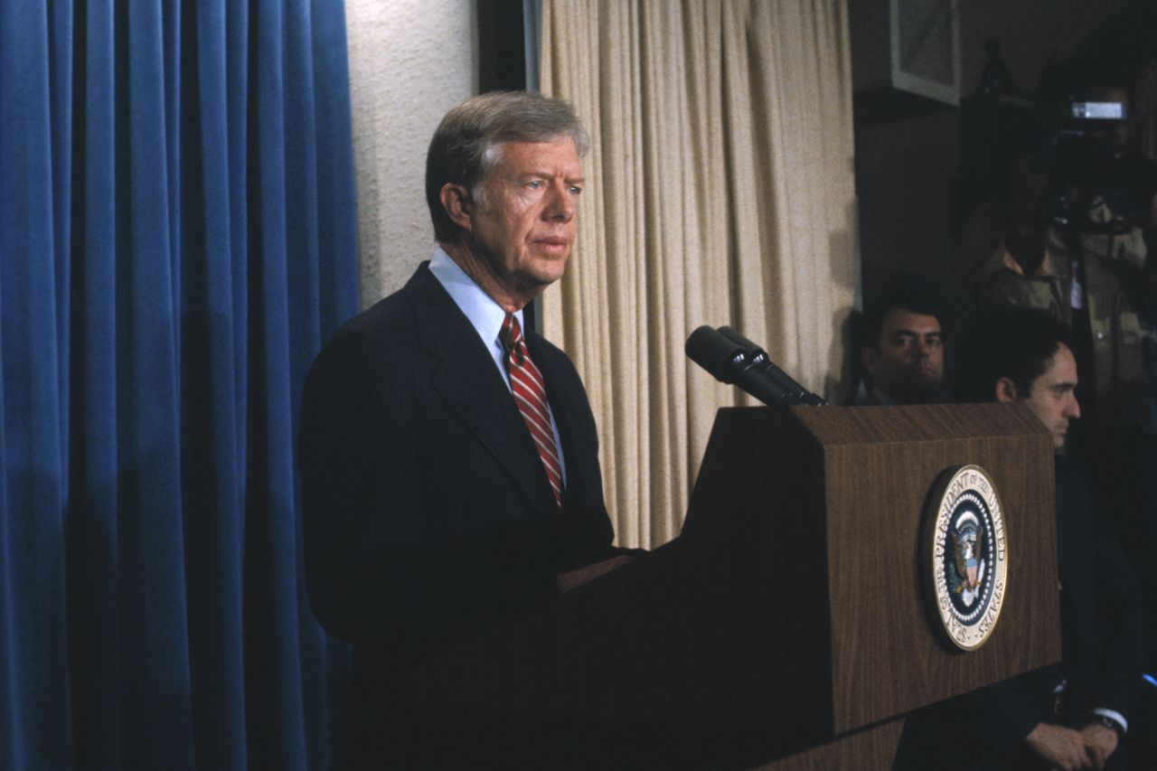 President Carter announces that he has broken diplomatic relations with the government of Iran because of the 