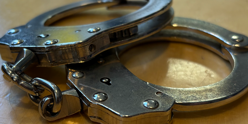 Man Violating Curfew Found Hiding in Bank Foyer