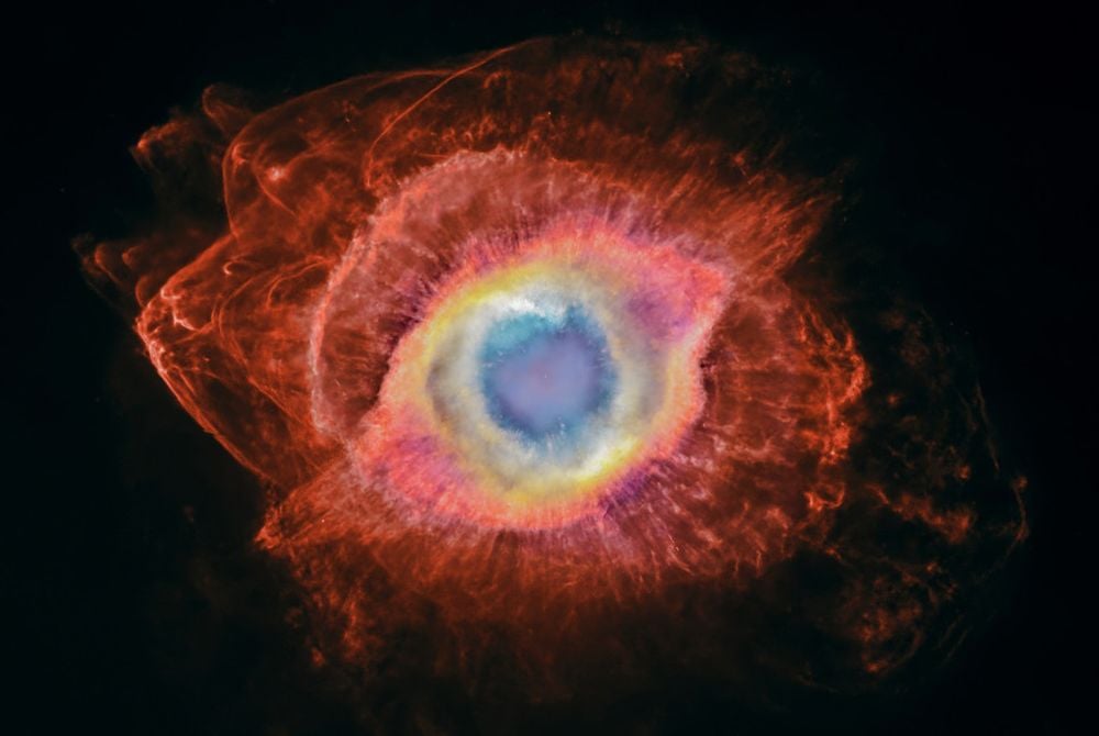This is the Helix Nebula as captured by the MOTHRA telescope, combined with data from the Hubble Space Telescope and the Kitt Peak 4m telescope. New observations revealed more detail in the planetary nebula, showing where material cast-off from the star that created the nebula is being stripped down and recycled. Image Credit: Credit for the previous data: NASA, ESA, C. R. O’Dell (Vanderbilt University) and M. Meixner, P. McCullough and G. Bacon (Space Telescope Science Institute). Credit for the combination of MOTHRA, Hubble and Kitt Peak data: Andrew McCarthy