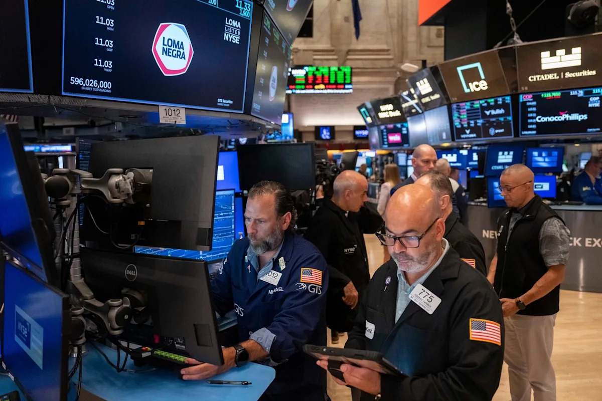Wall Street rises near a record as AI stocks climb and worries about inflation ease a bit