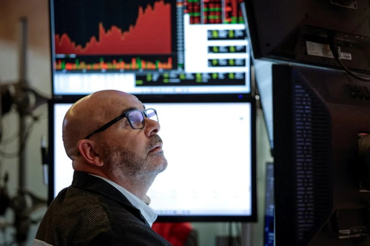 Wall St rises as yields ease, Moderna lifts healthcare stocks