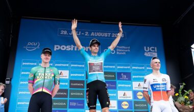 Overall winner Wout Van Aert celebrates on the podium next to second placed Lukas Kubis and third placed Henrik Breiner Pedersen at the Tour of Denmark 2026
