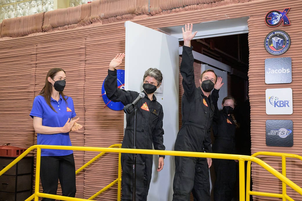 The CHAPEA Mission 1 crew enters their 1,700 square foot Mars surface simulation habitat at NASA's Johnson Space Center, the start of a 378 day analog mission designed to study crew health and performance in isolation (Credit : NASA/Josh Valcarcel)