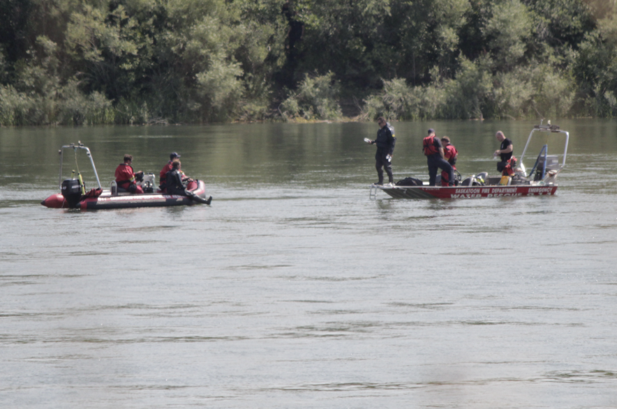 Saskatoon firefighters during a search-and-rescue operation on the South Saskatchewan River on July 31, 2026.