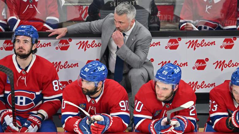 Head coach Martin St. Louis of the Montreal Canadiens looks on