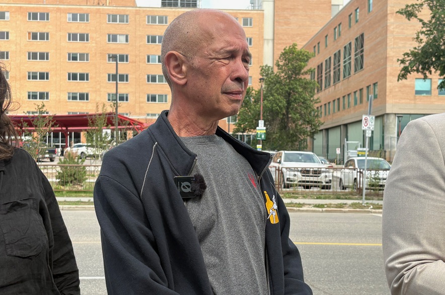 Mark Shyluk speaks to media on Aug. 5, 2026 about his elderly father, Jerry, and his difficult visit to St. Paul's Hospital earlier this year. (Mia Holowaychuk/650 CKOM)