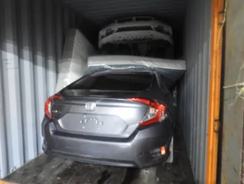 Stolen cars jammed into shipping container lead to charges Brampton men