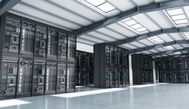 A data center featuring rows of server racks in a spacious, modern facility.