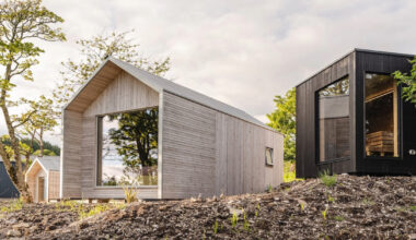 gabled timber cabins by córr nestle into scotland’s rugged landscape