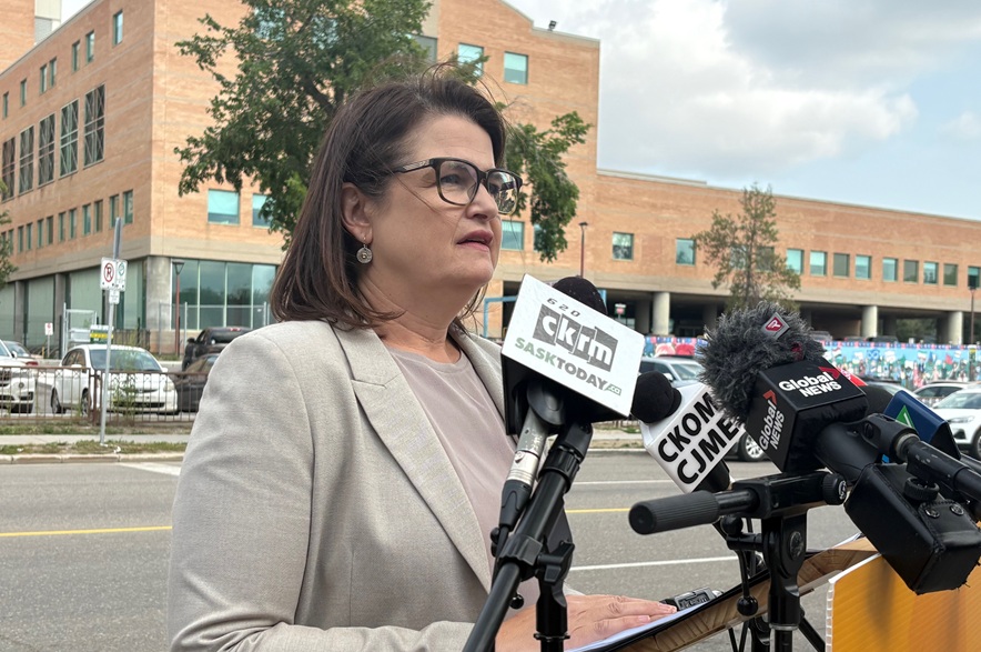 Saskatchewan NDP leader, Carla Beck, speaks about the poor state of health care in Saskatchewan in front of St. Paul's Hospital on Aug. 5, 2026. (Mia Holowaychuk/650 CKOM)