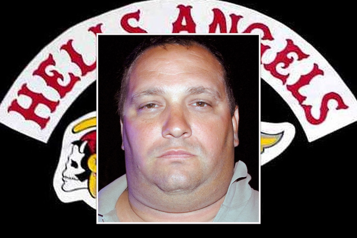 The Hells Angels logo with a centred inset image of a man.