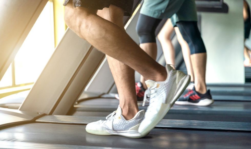 PERSON WALKING ON TREADMILL