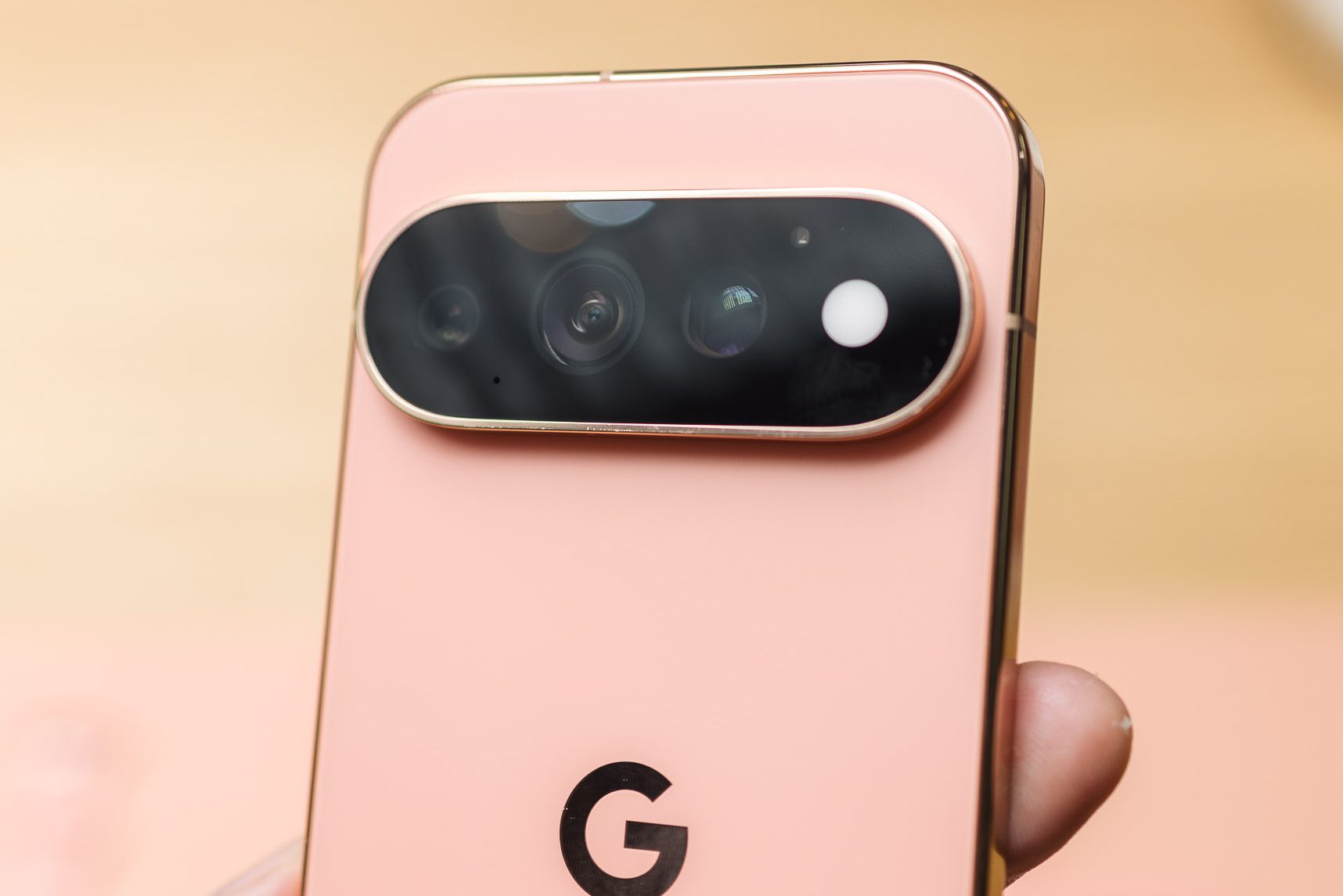 A hand holds a Google phone
