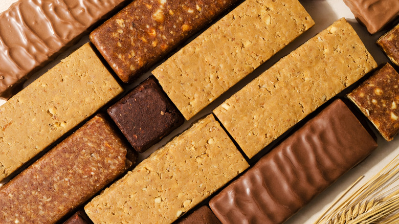 variety of protein bars stacked together