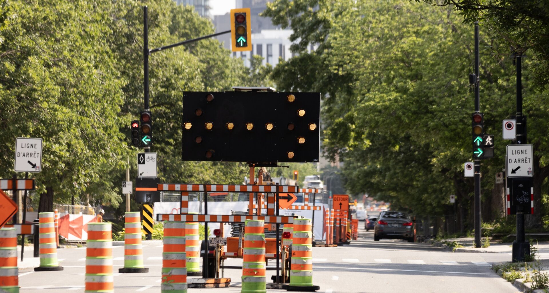 Orange cones close a lane for roadwork