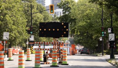 Orange cones close a lane for roadwork