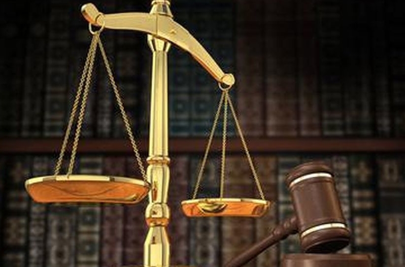 Scales of justice and a gavel.