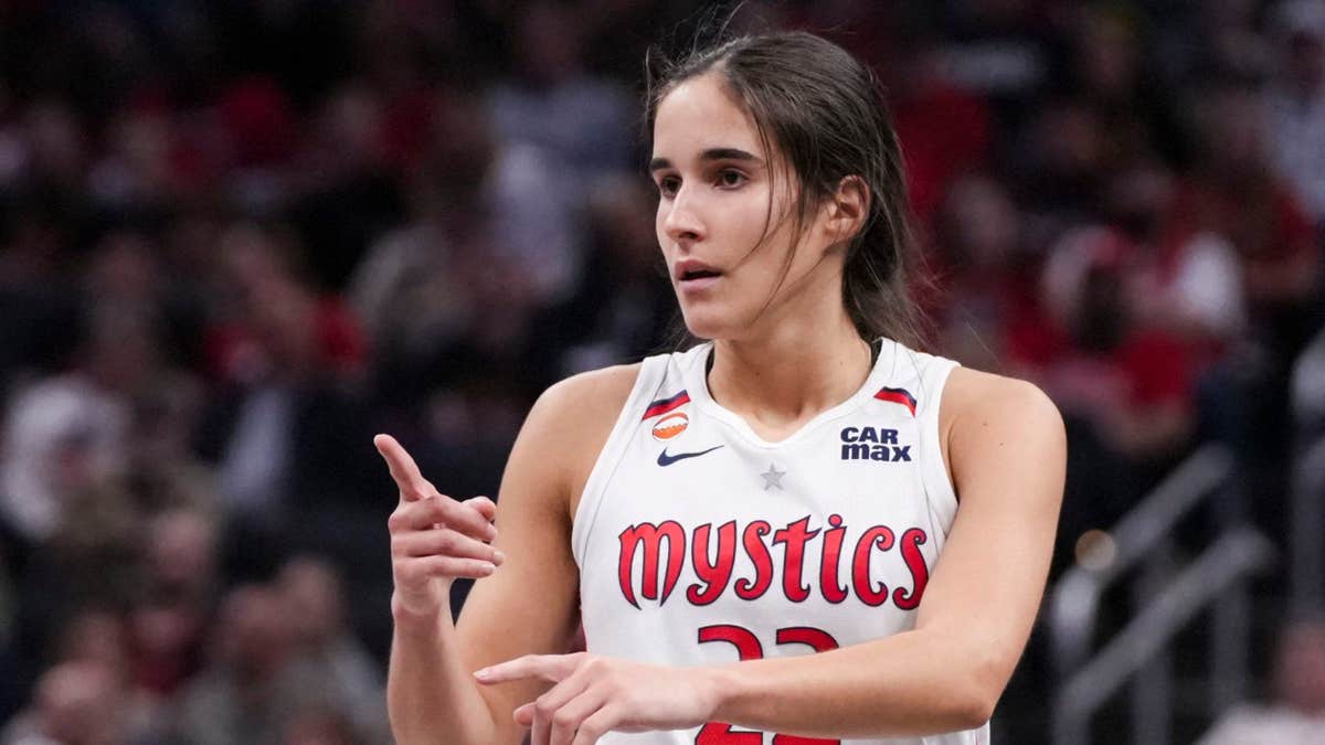 Washington Mystics guard Sonia Citron celebrating during a basketball game at Gainbridge Fieldhouse