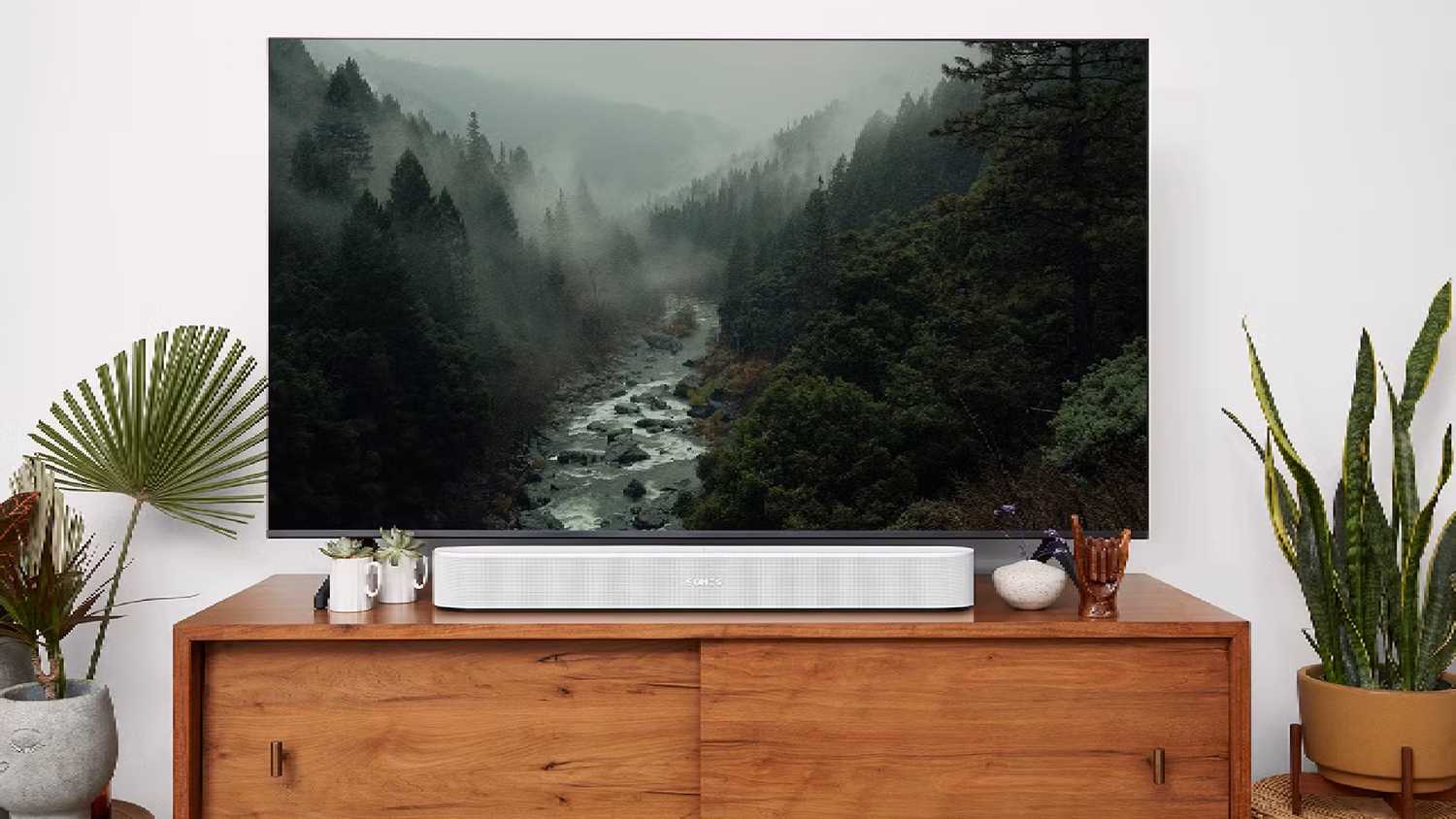 A Sonos Beam Gen 2 under a TV.