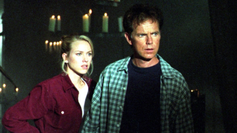 Kate Russell and Nathan Bradford standing side by side in 