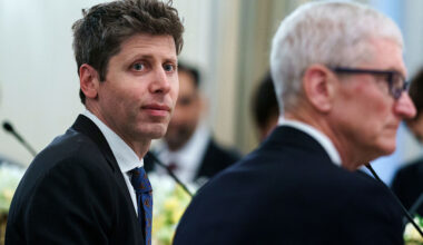 Sam Altman, chief executive officer of OpenAI Inc., left, and Tim Cook, chief executive officer of Apple Inc.