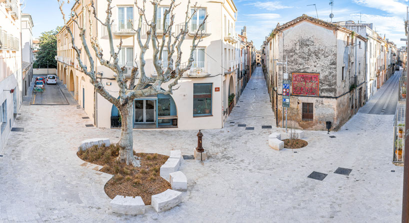 carved travertine transforms paving, furniture, and planting across spanish historic old town - 1