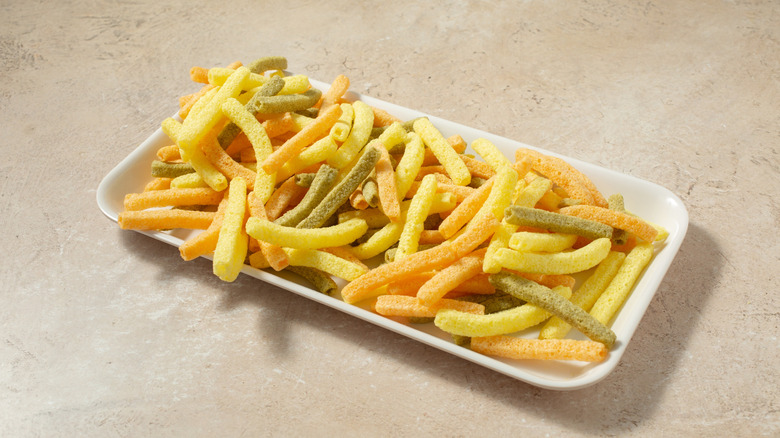 veggie straws on a white plate