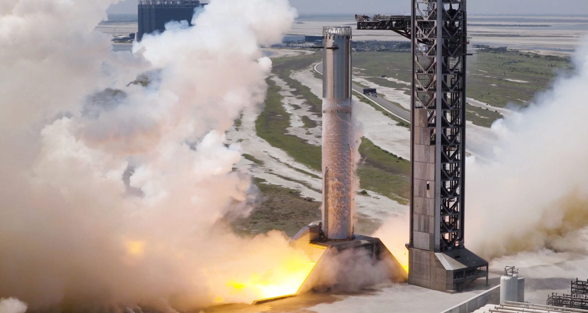 SpaceX test-fires Starship Super Heavy booster ahead of critical Flight 14
