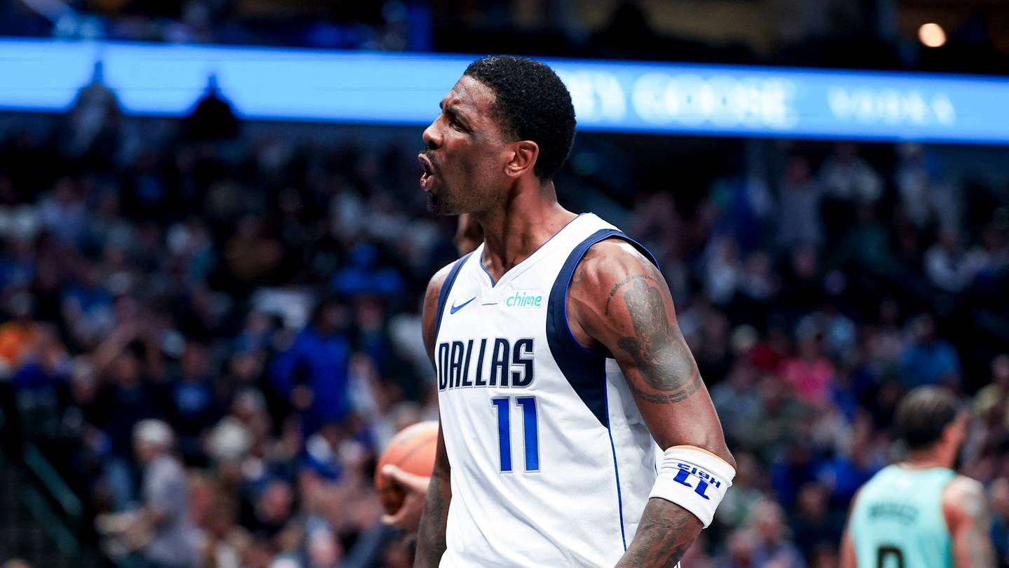 Feb 27, 2025; Dallas, Texas, USA;  Dallas Mavericks guard Kyrie Irving (11) reacts after scoring against the Charlotte Hornets during the second half at American Airlines Center. Mandatory Credit: Kevin Jairaj-Imagn Images