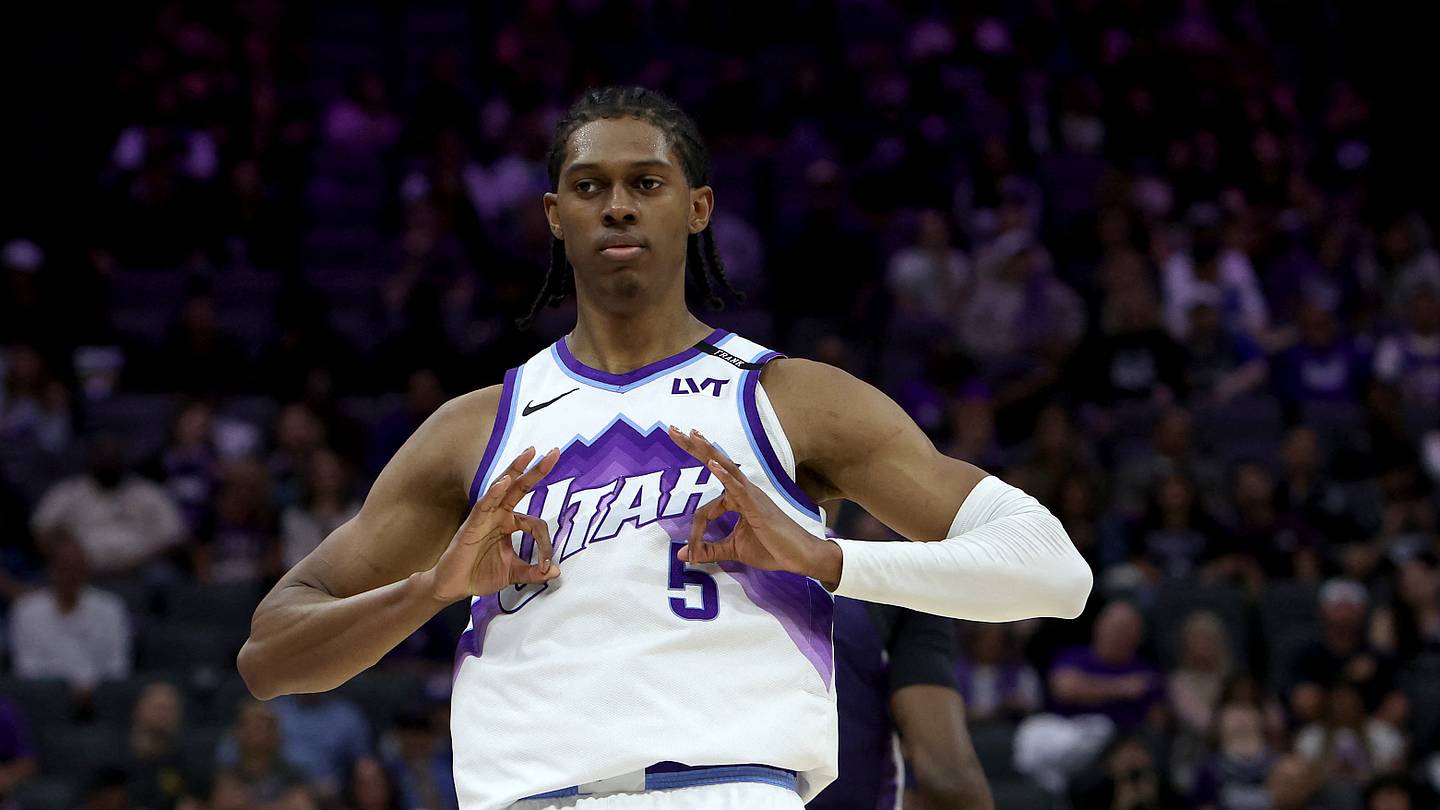 Mar 15, 2026; Sacramento, California, USA; Utah Jazz forward Cody Williams (5) reacts towards his bench after making a three-point basket against the Sacramento Kings during the fourth quarter at Golden 1 Center. Mandatory Credit: Dennis Lee-Imagn Images