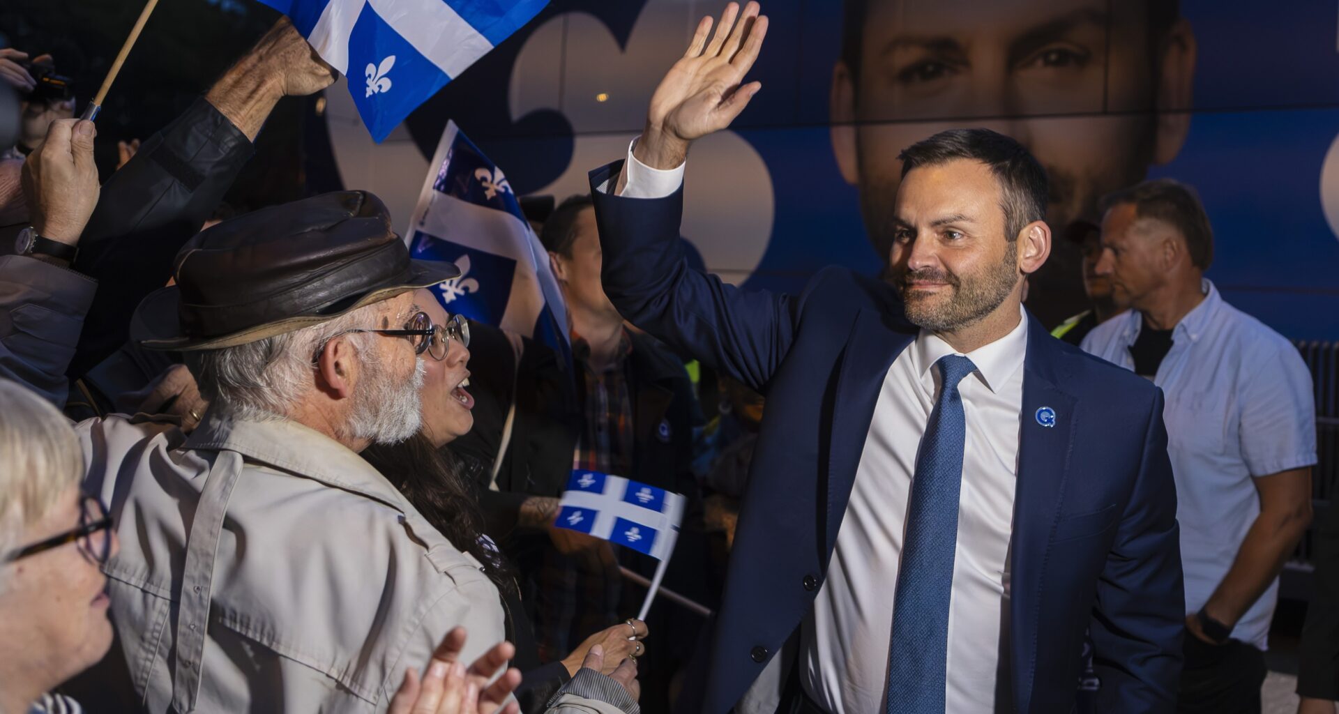 Parti Québécois Leader Paul St-Pierre Plamondon waves to his supporters as he arrives at the National Assembly in Quebec City