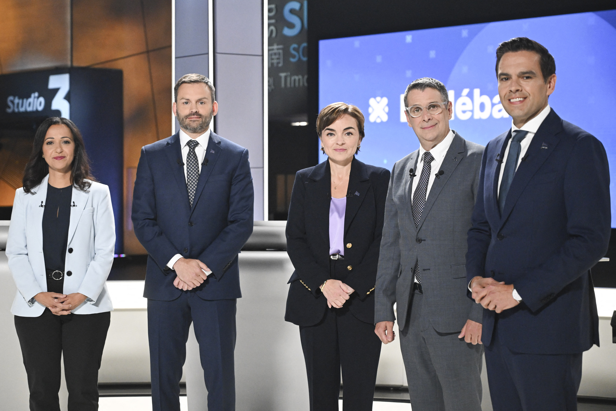 Quebec's five main party leaders pose at the Radio-Canada studios ahead of their debate