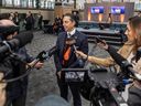 B.C. Lions owner Amar Doman talks to media during a press conference in Victoria in 2023. 