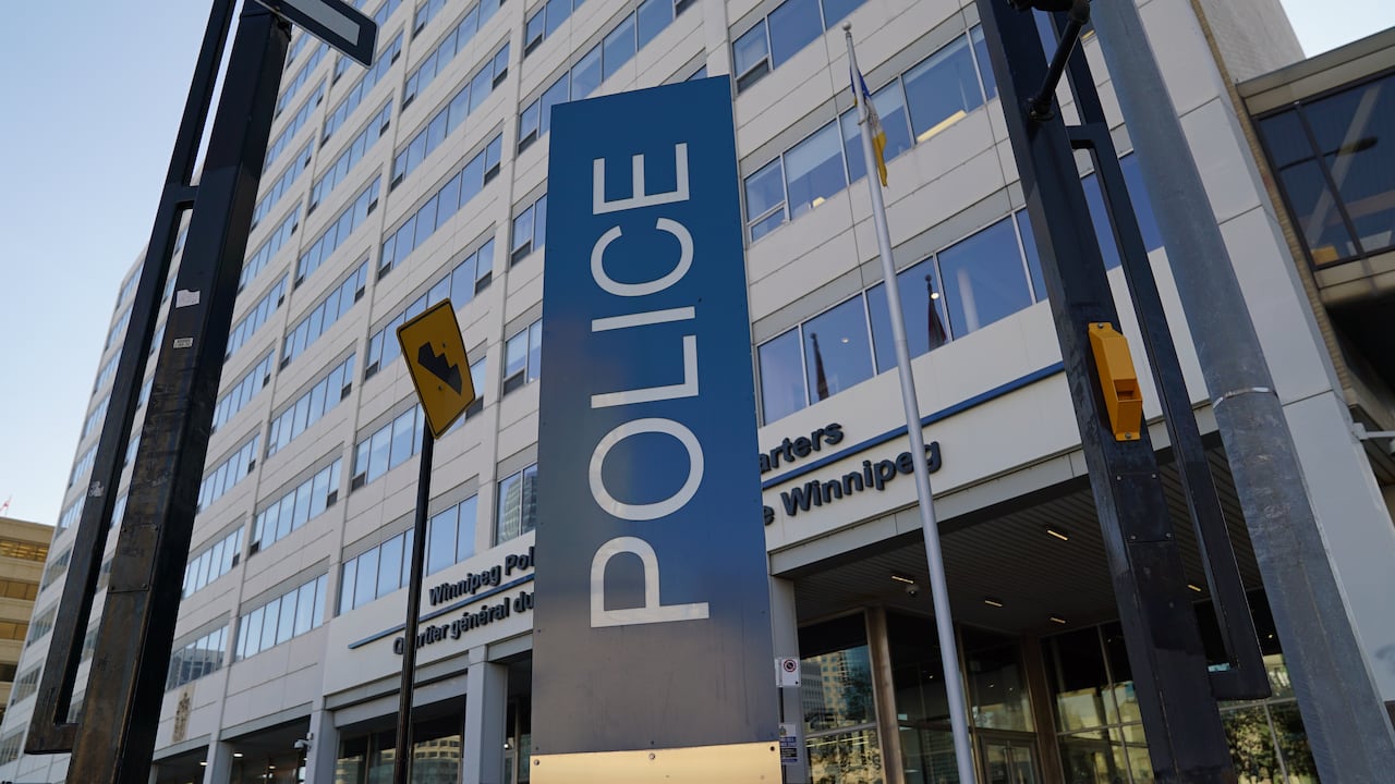 A photo of Winnipeg's police headquarters with the word police on it. 