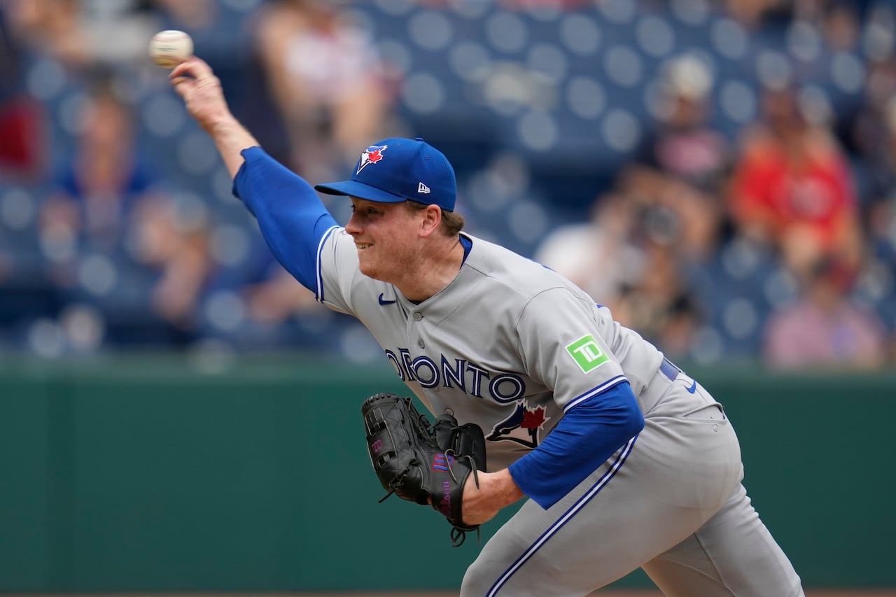 Toronto Blue Jays closer Louis Varland throws a pitch from the mound during the ninth inning of a game against the Cleveland Guardians at Progressive Field.