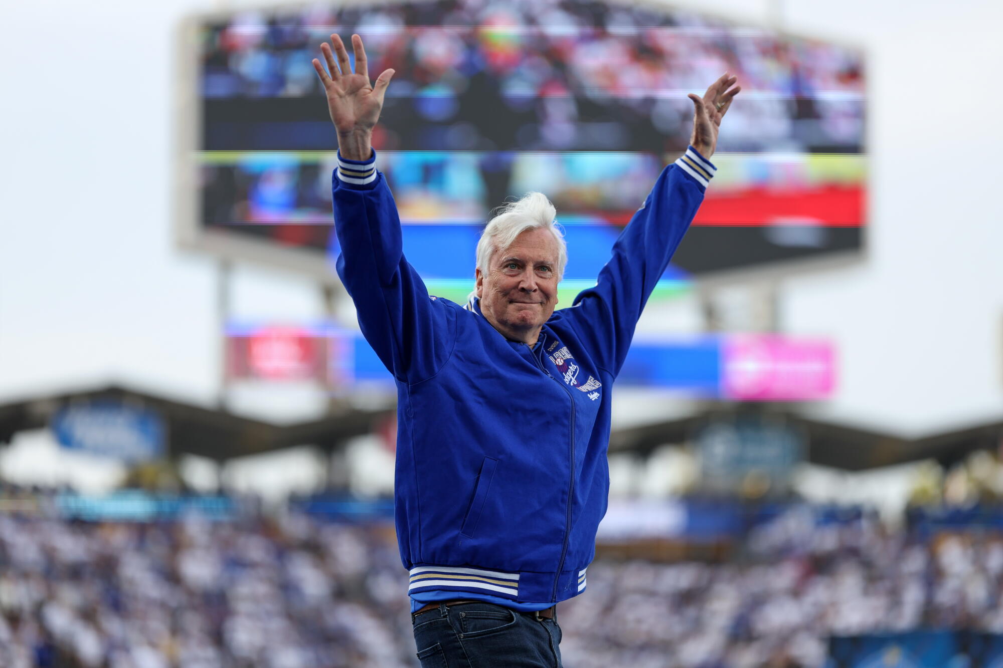CEO and Owner Mark Walter of the Los Angeles Dodgers waves to the crowd