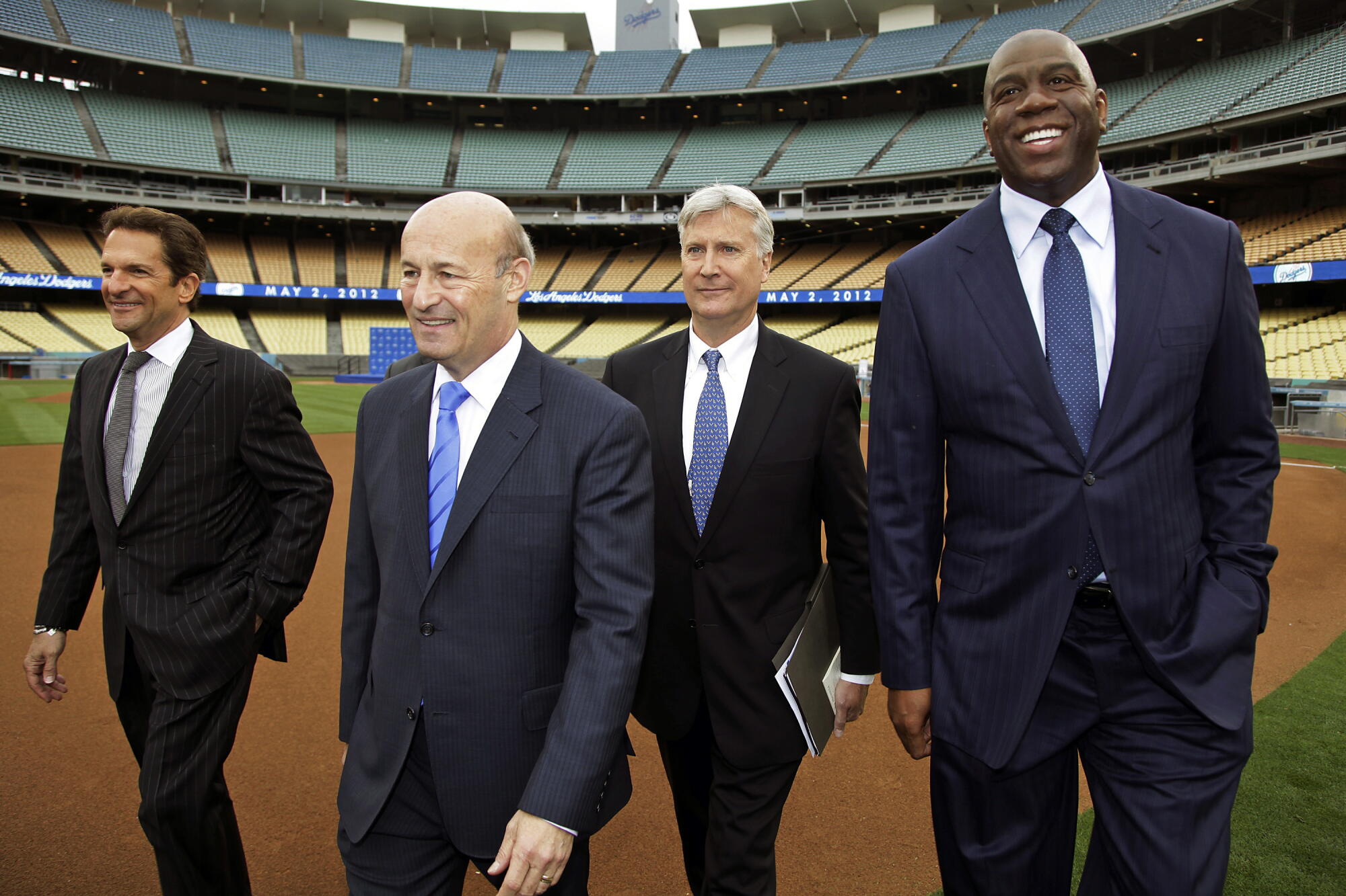 From left, new Los Angeles Dodgers owners and Guggenheim Baseball Management partners