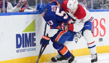 New York Islanders center Casey Cizikas (53) battles Montr&eacute;al Canadiens defenseman Arber Xhekaj (72) for the puck in the second period at UBS Arena.