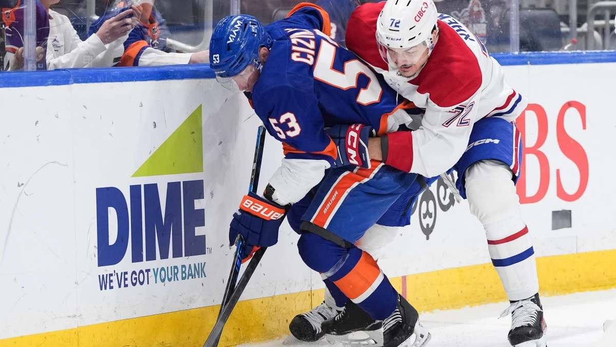 New York Islanders center Casey Cizikas (53) battles Montr&eacute;al Canadiens defenseman Arber Xhekaj (72) for the puck in the second period at UBS Arena.