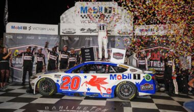 Christopher Bell celebrates in victory lane after NASCAR Cup Series race at Darlington.
