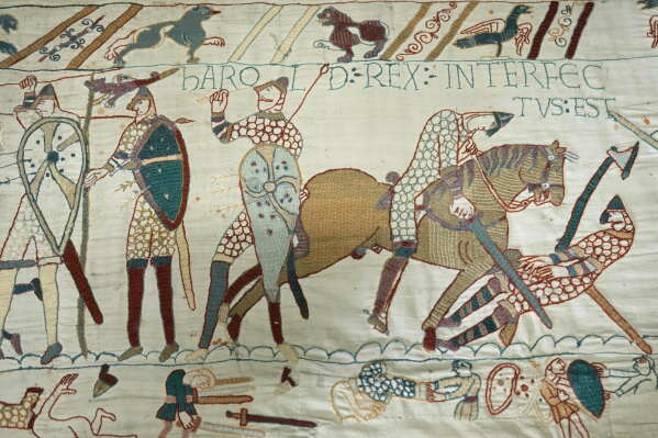 The 70-meter-long Bayeux Tapestry is displayed during a press preview at the British Museum in London after returning to England, following a historic agreement between the UK and France, Monday, Sept. 7, 2026. (AP Photo/Kin Cheung)
