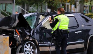 PHOTOS: SUV crashes at SkyTrain pillar in Surrey, IIO called to investigate