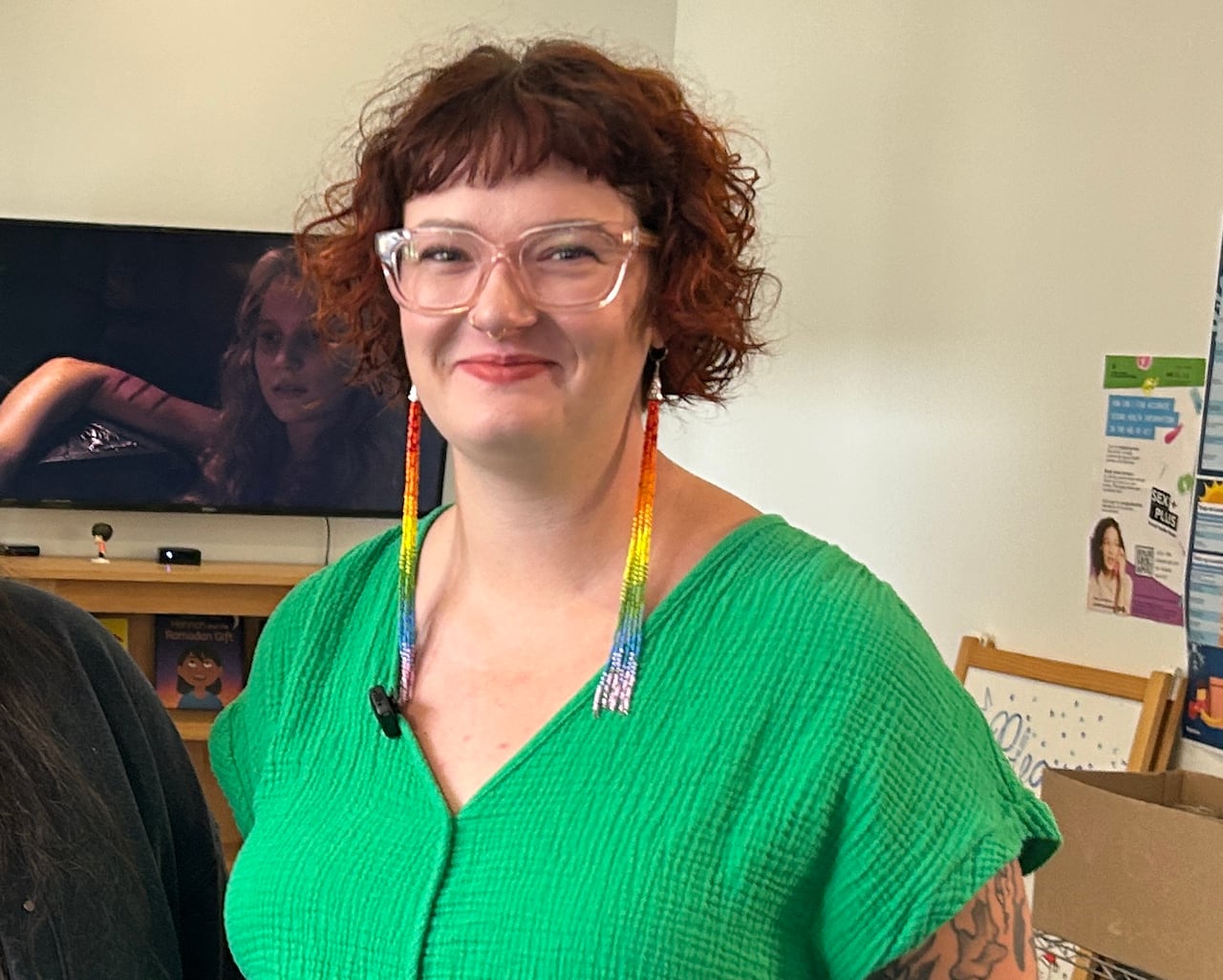 Two women standing next to each other in a clinic.