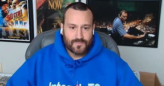 Man in Blue hoodie. 