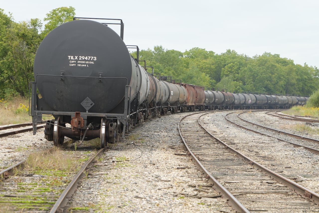 Tanker cars sit on abandoned tracks
